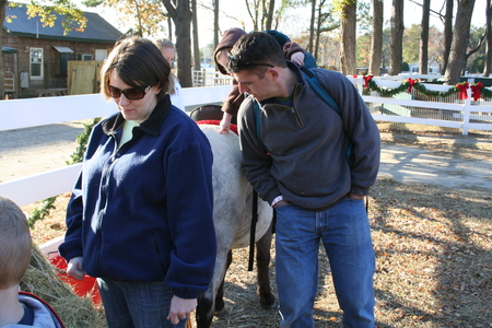 gabe pets the pony